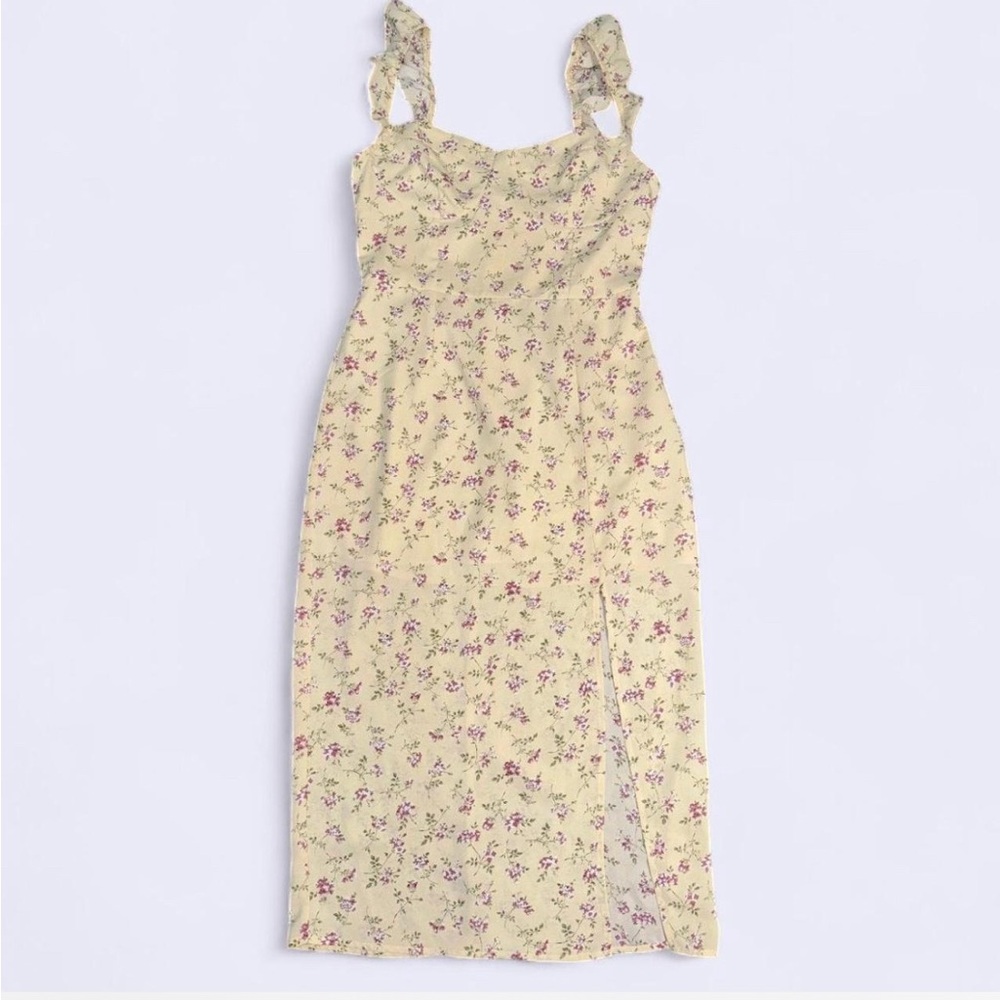Light yellow floral dress with ruffle spaghetti straps and slit